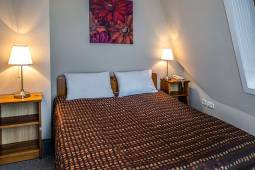 corvin-hotel-budapest-corvin-wing-suite-bedroom.jpg